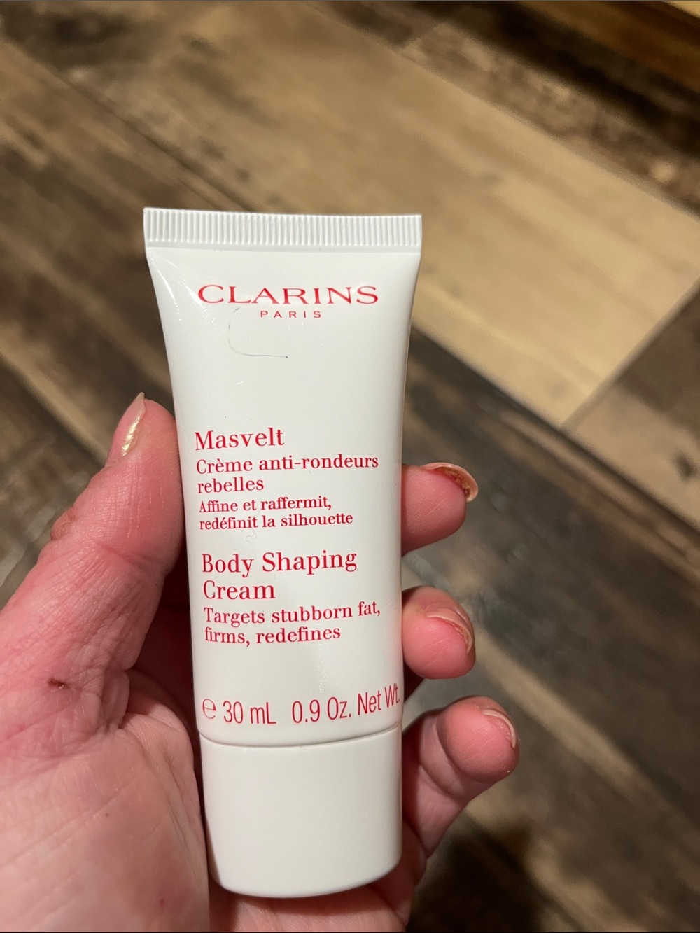 Clarins White Tube with Red Text Body Shaping Cream